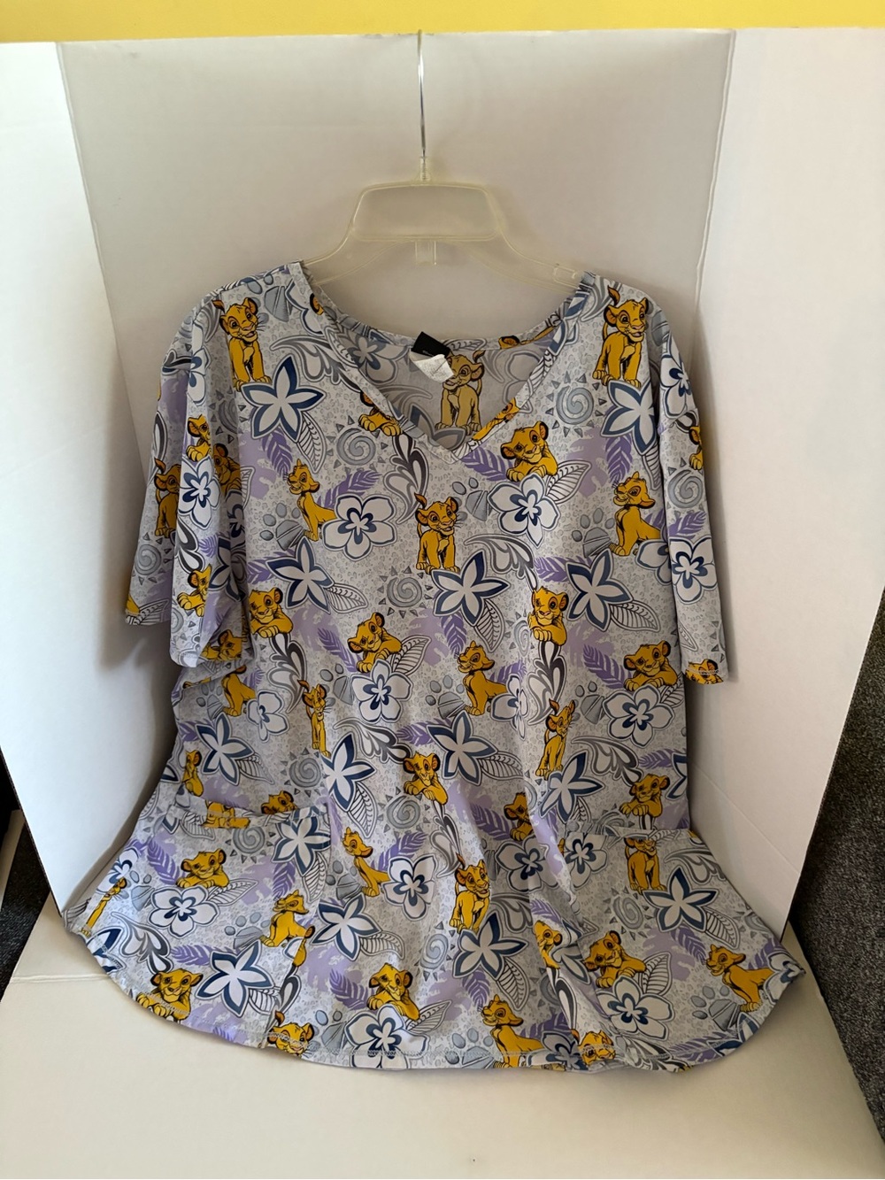 Disney Lavender Floral V-Neck Top with Yellow Character Print and Blue Accents